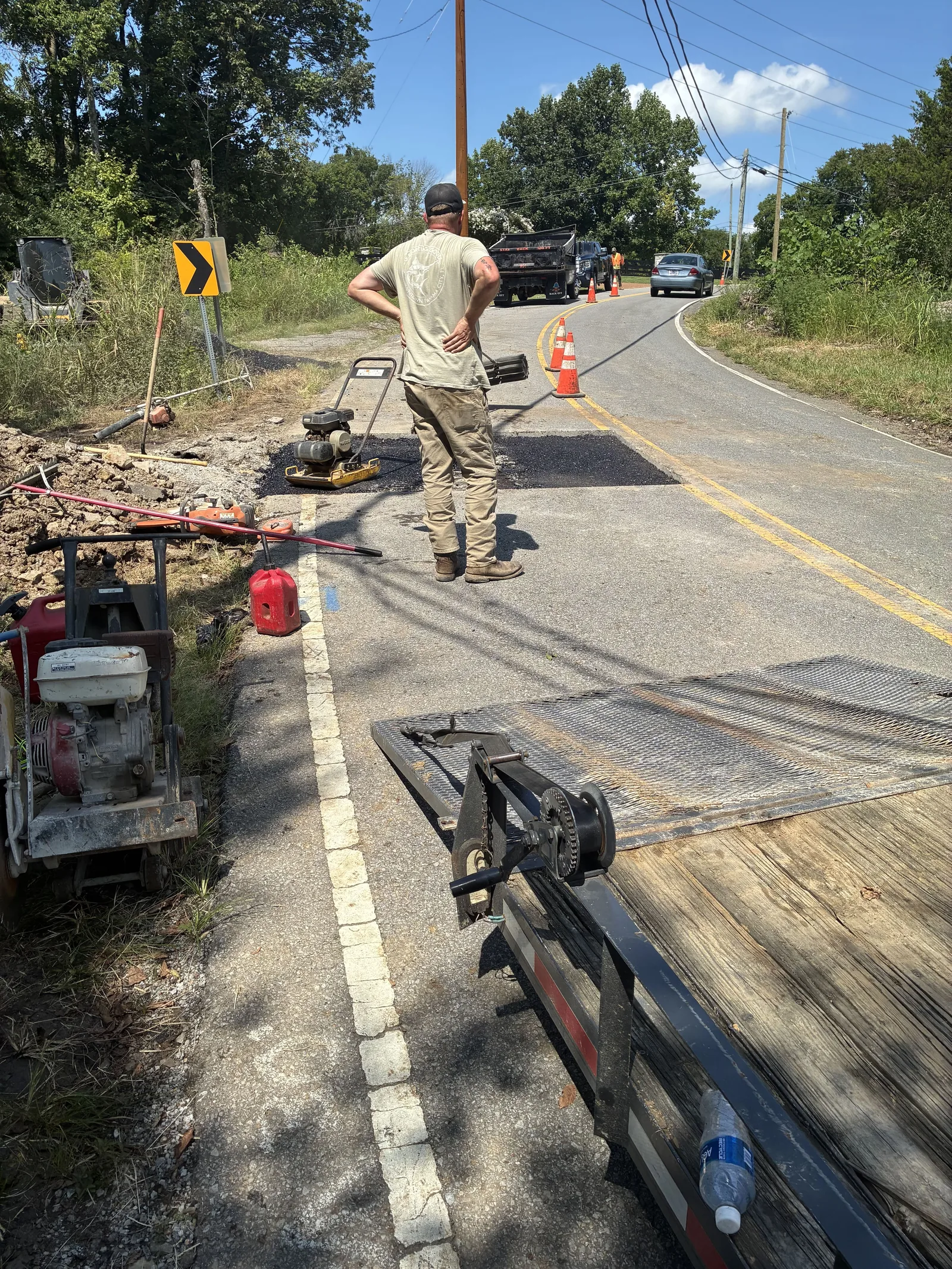 Sewer line road crossing with the cut prepped for asphalt